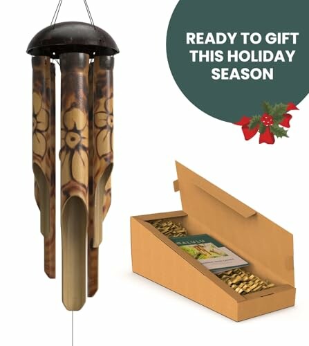 Bamboo wind chime with floral design and gift box, ready for holiday season.