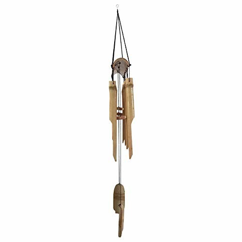 Bamboo wind chime hanging against a white background