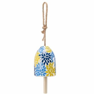 Ceramic wind chime with blue and yellow floral pattern and rope hanger.