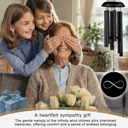 Two children surprising an elderly woman with a gift and wind chimes.