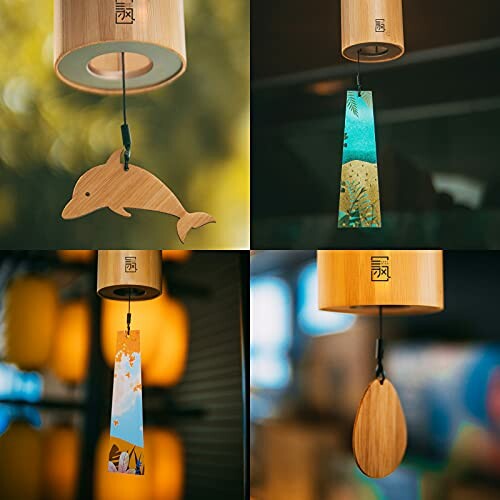 Four Japanese wind chimes with diverse designs hanging outdoors.