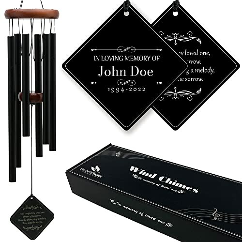 Memorial wind chimes with inscription for John Doe, 1994-2022.