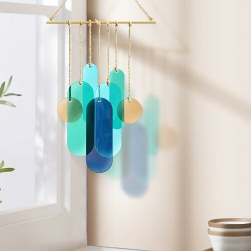 Colorful glass suncatcher hanging indoors.