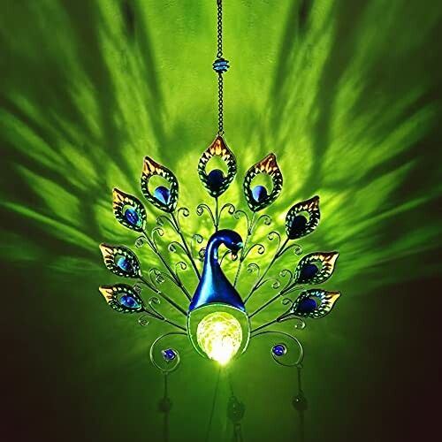 Peacock design wall light with green illumination