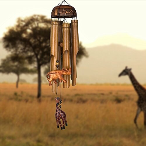 Bamboo wind chime with giraffe and elephant designs in savannah setting