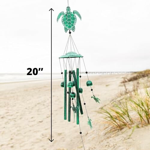 Green sea turtle wind chime on a beach