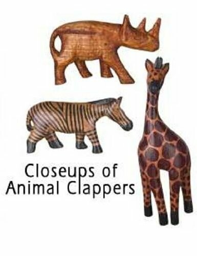 Wooden animal clappers shaped like rhino, zebra, and giraffe.