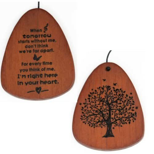 Wooden guitar pick with heartfelt inscription and tree illustration.